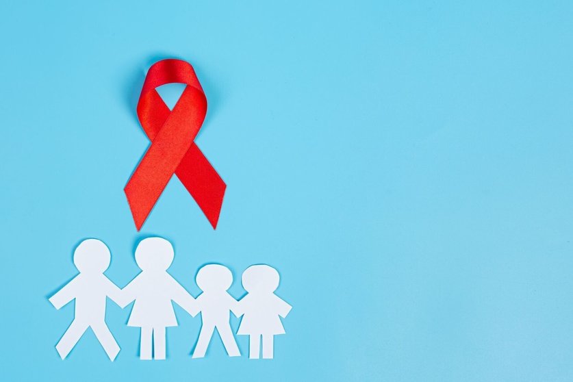 red-knowledge-ribbon-and-family-cut-paper-hiv-awareness-world-aids-day-and-world-sexual-health-day
