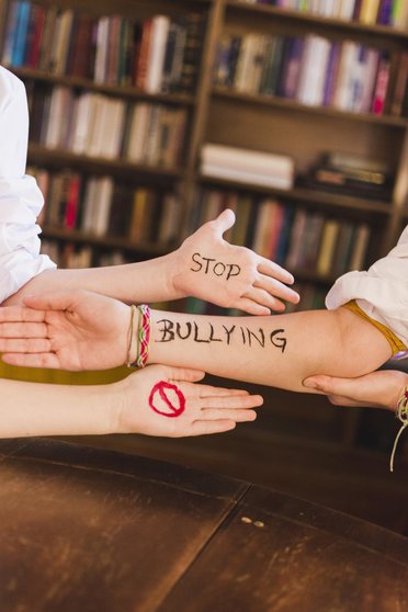 stop-bullying-slogan-on-children-s-arms