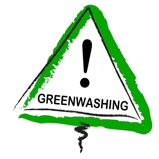 Greenwashing and isolated green warning sign against white background